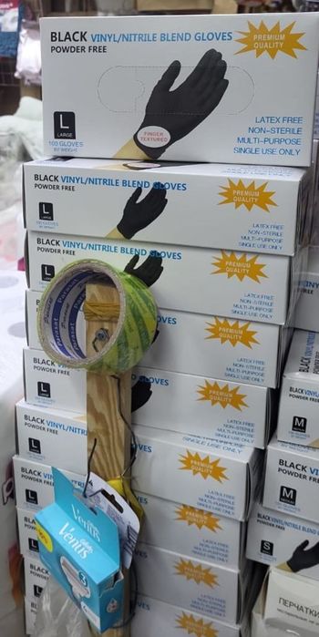 Одноразовые виниловые перчатки