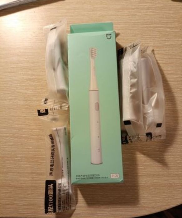 Новая электрическая зубная щетка