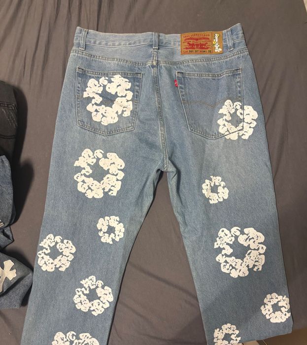 дънки на denim tears