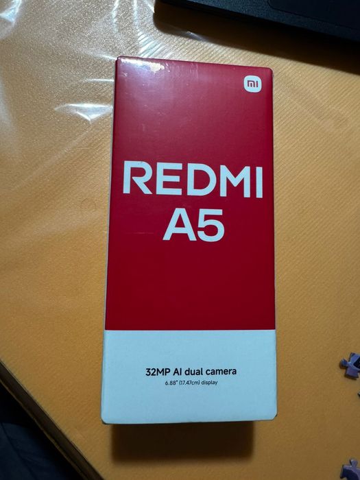 Телефон смартфон Redmi A5
