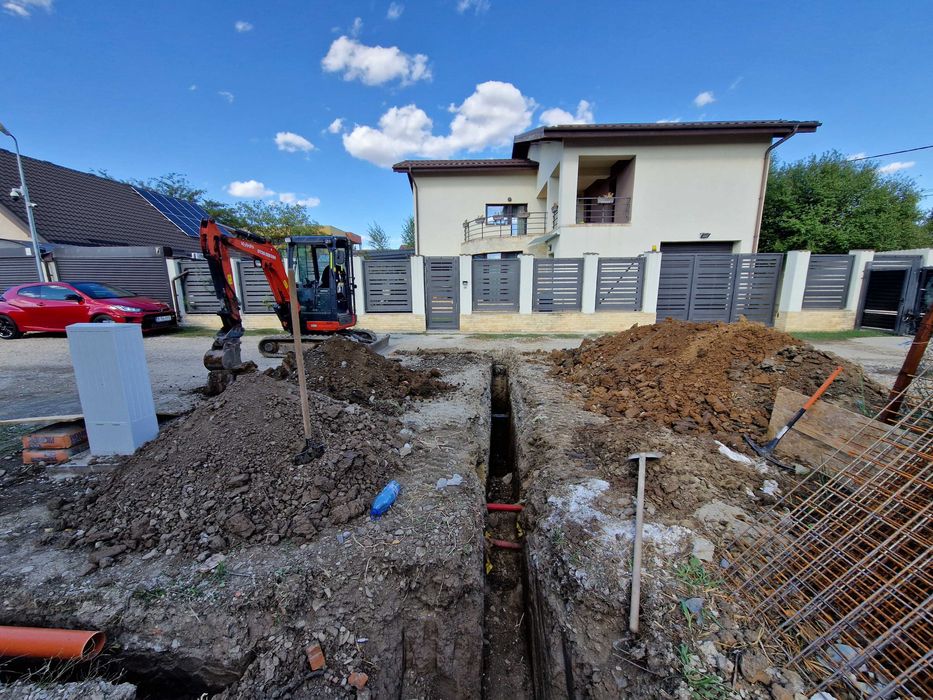 excavator cu deservent