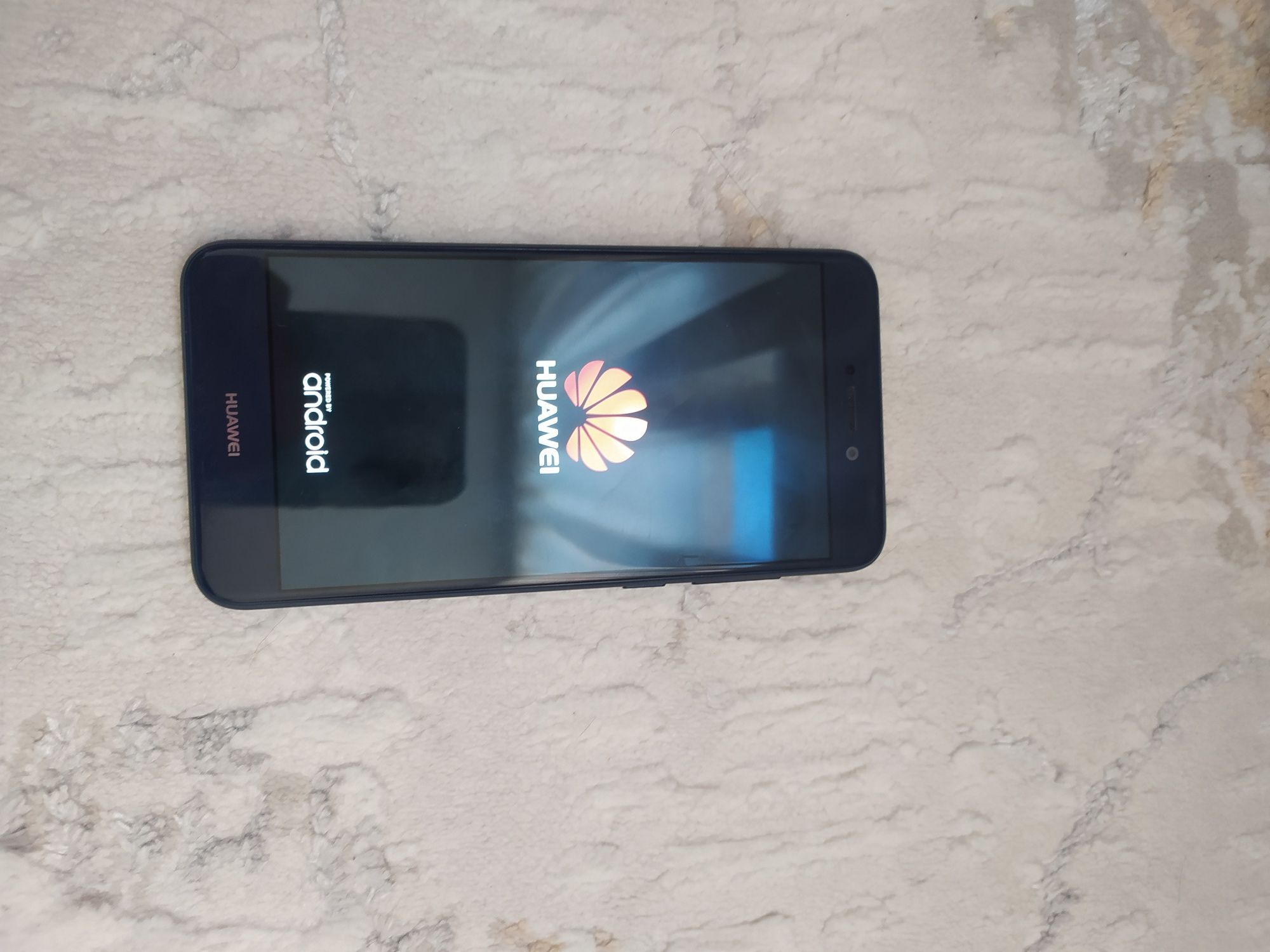 Huawei андроид, отличный.