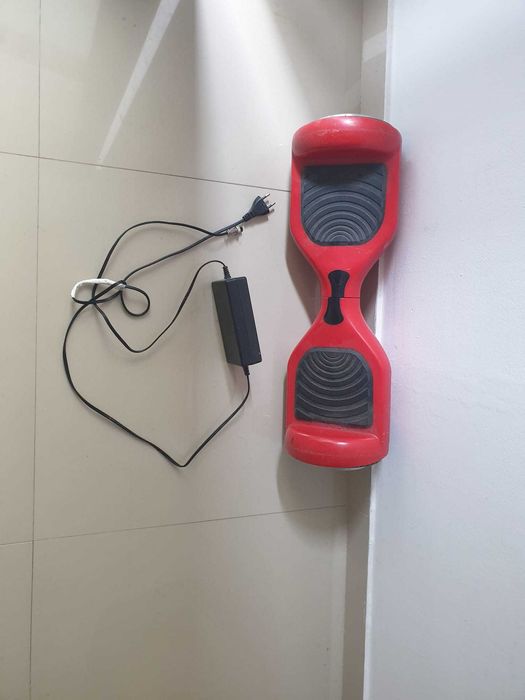 Hoverboard cu incarcator de priza  si / sau schimb