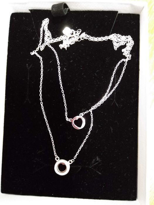 Сребърно колие със сърца