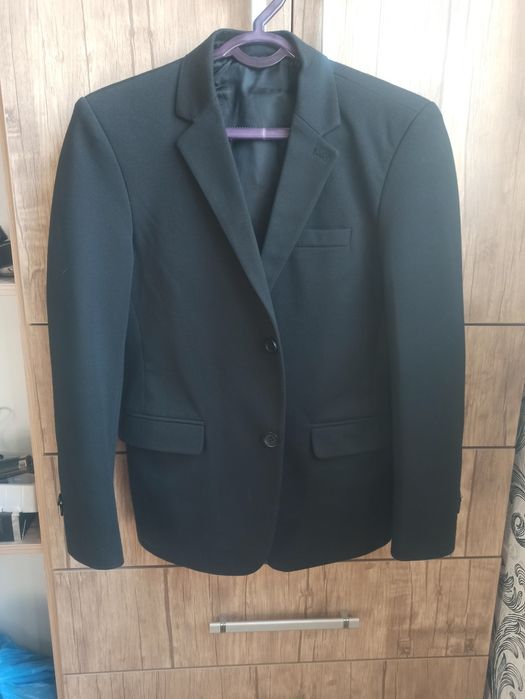 Пиджак школьный б/у .