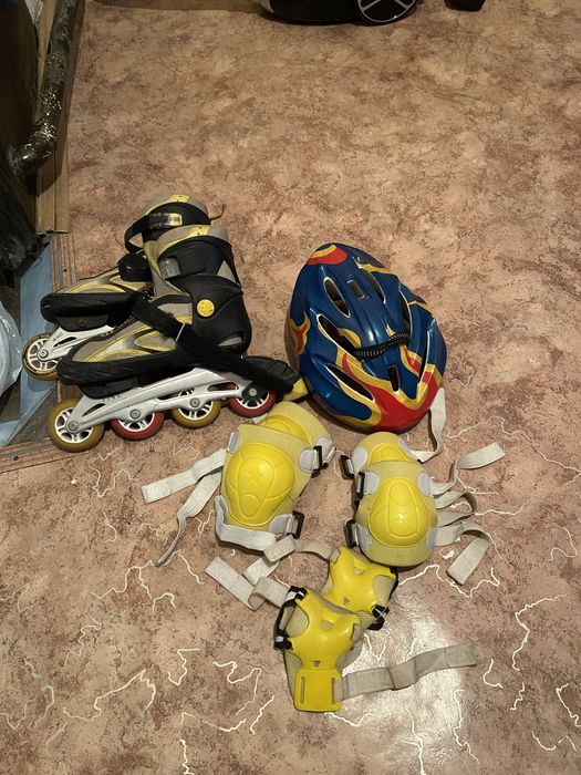 Роликовые коньки с комплектом защиты