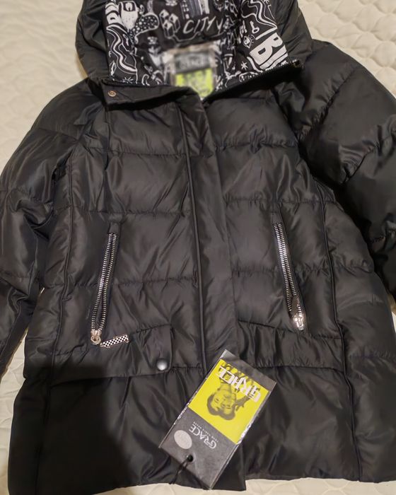 Продам пуховик женский