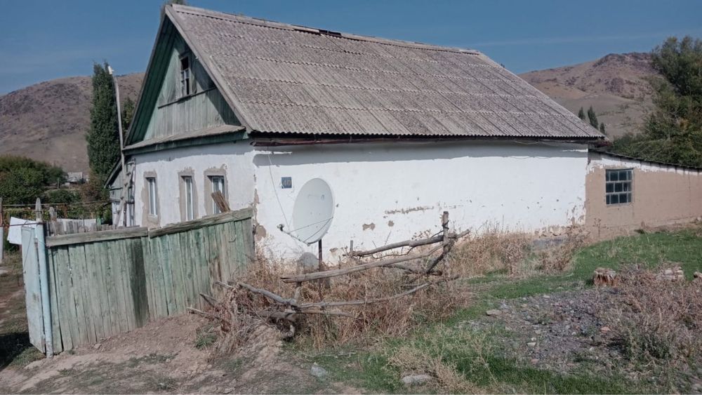 Дом с участком в Шарбакты