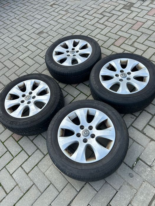 Vând jante aliaj originale Opel cu anvelope de iarna