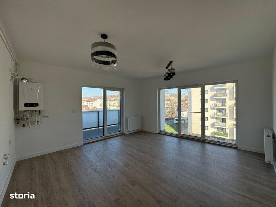Apartament finisat 4 camere, 2 bai, 93,3 mp utili, etaj retras, Dambul
