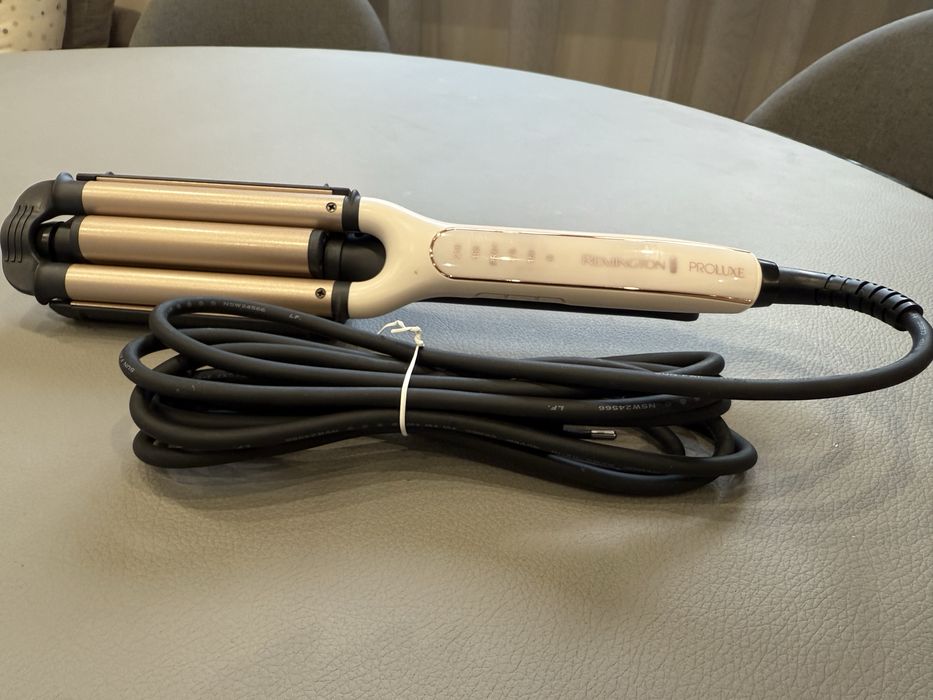 Ретро преса Remington PROluxe 4-in-1 Adjustable Waver