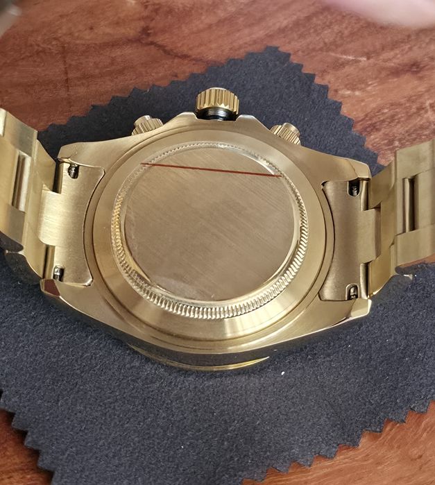 Rolex daytona gold