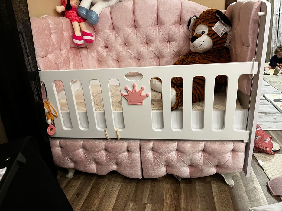 Детско легло с люлеещ механизъм