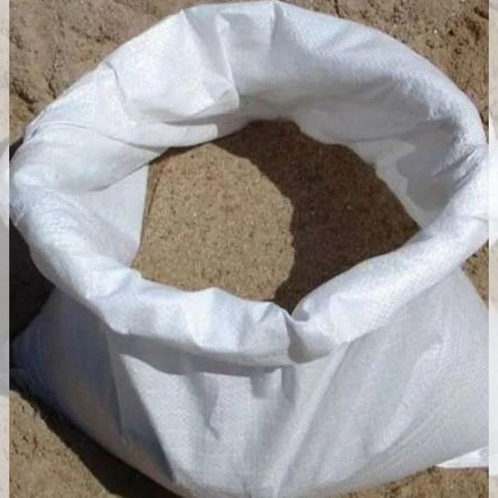 ПГС сеянный через сетку в мешках.