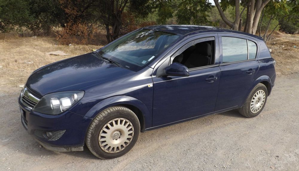 Опел Астра 2012 бензин