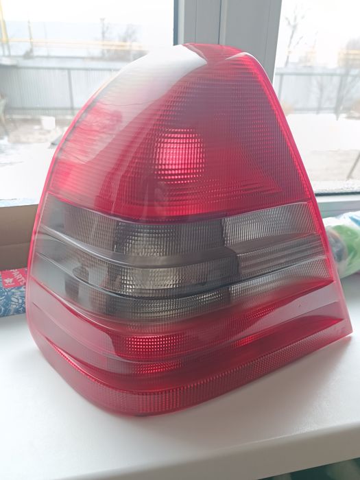 Фонарь левый c280 оригинал