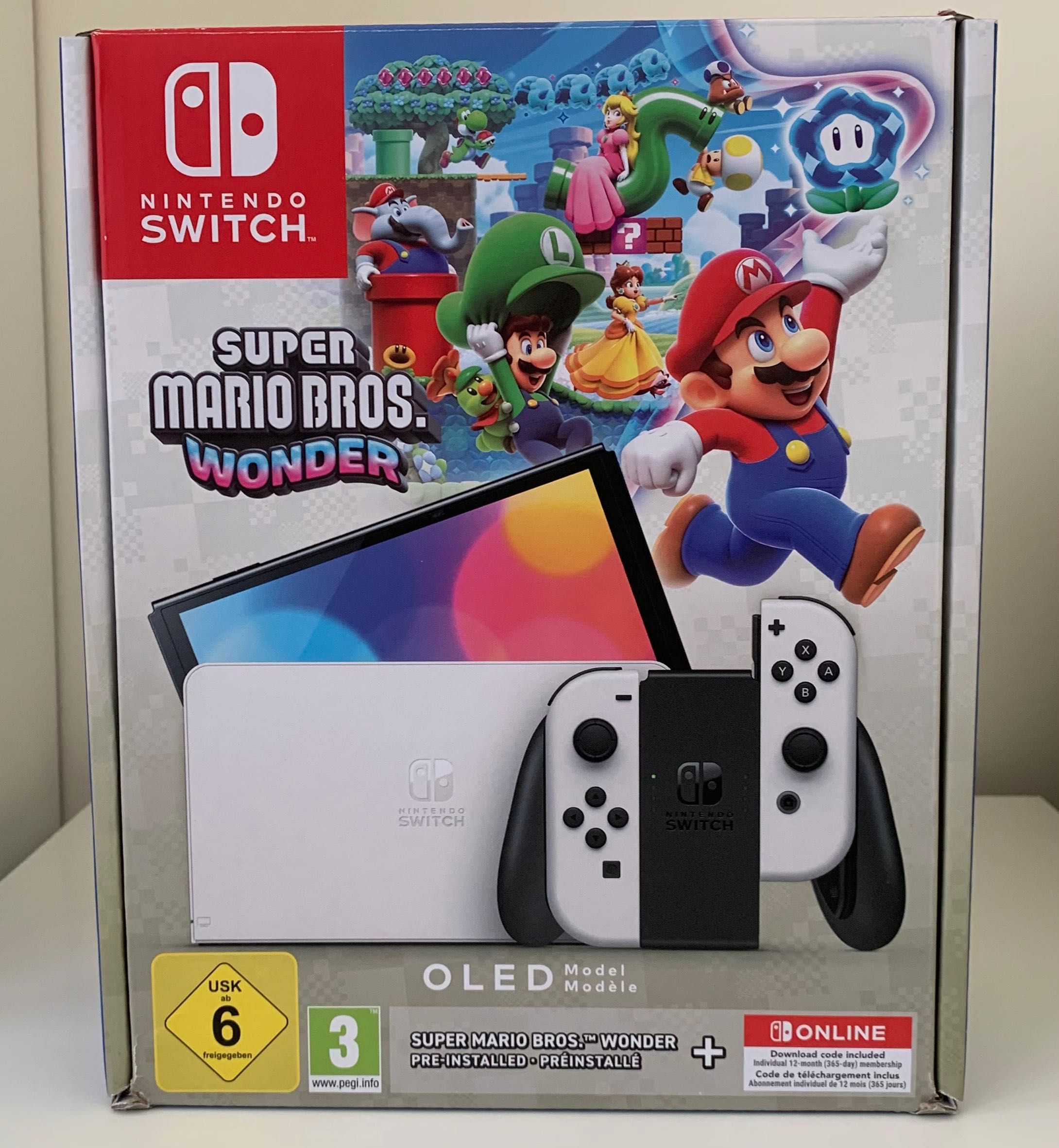 Nintendo Switch - OLED Model + Super Mario Wonder, Hogwarts Legacy