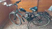 Bicicletă cu motor de vânzare