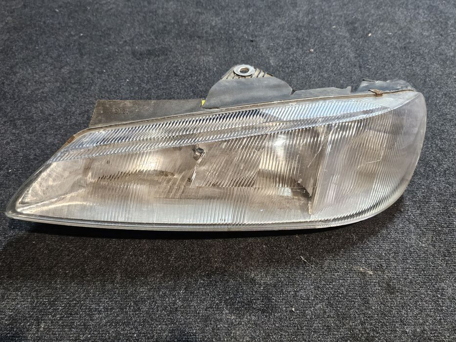 Far stanga original Peugeot 406