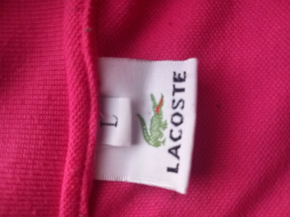 Vând tricou Lacoste roz în stare excelenta!!