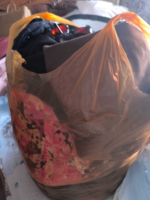 Отдам три пакета одежды