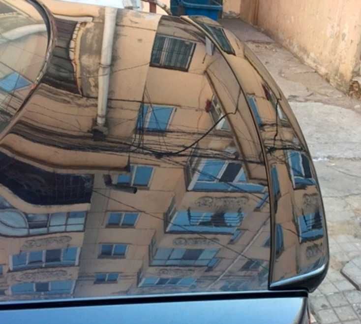 Eleron pentru portbagaj Volkswagen Jetta Mk5