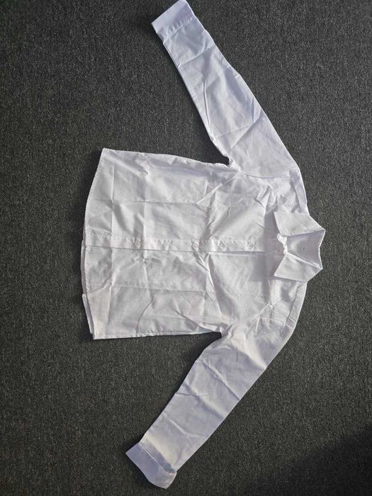 Продам белую рубашку на девочку в школу