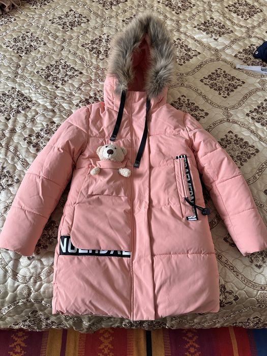 Продам новую зимнию куртку р.134