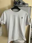 Tricou polo alb.