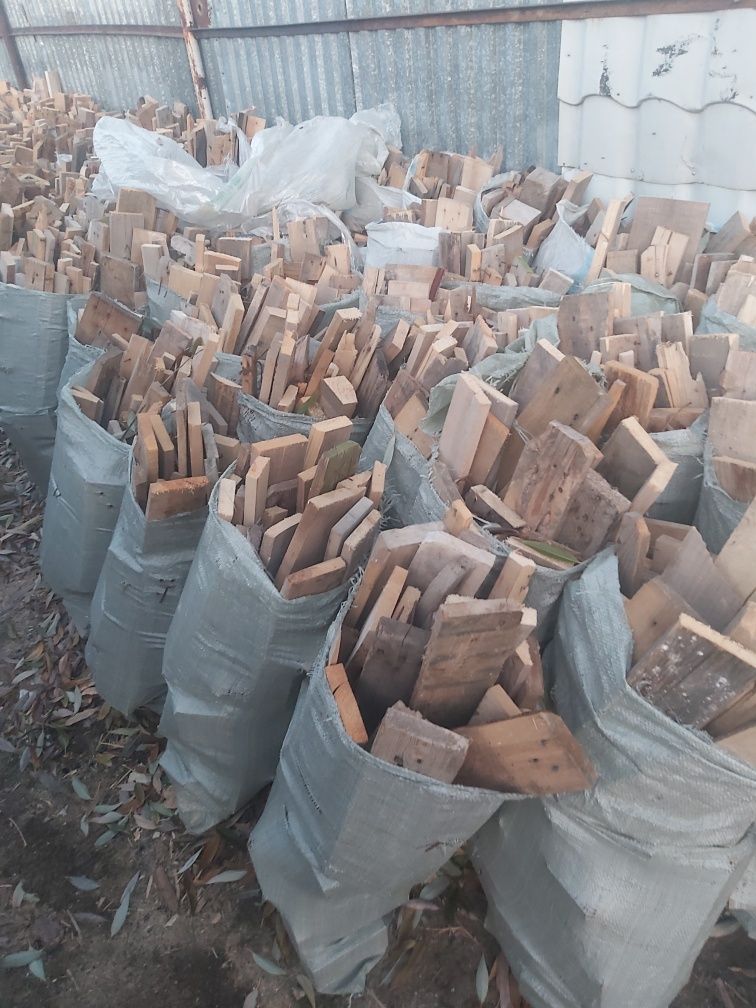 Дрова в мешках 1200тг