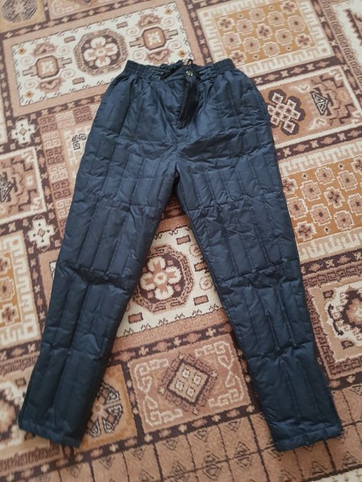 Продам или меняю . Новые зимние брюки на халлофайбере.