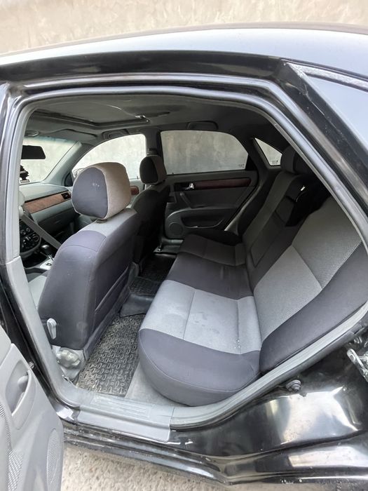 Lacetti 1.8 2010 yil qora 157.000 probeg