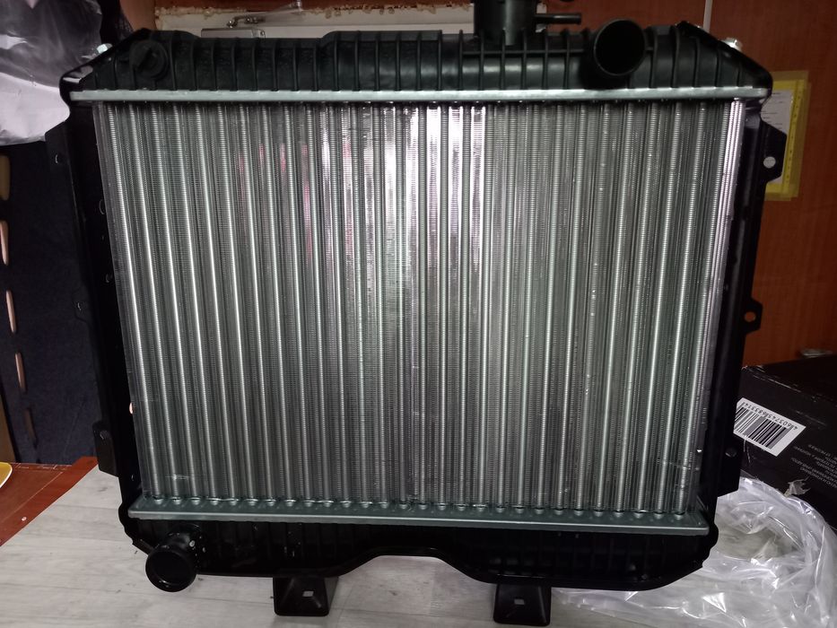 Продам радиатор охлаждения на уаз хантер,469