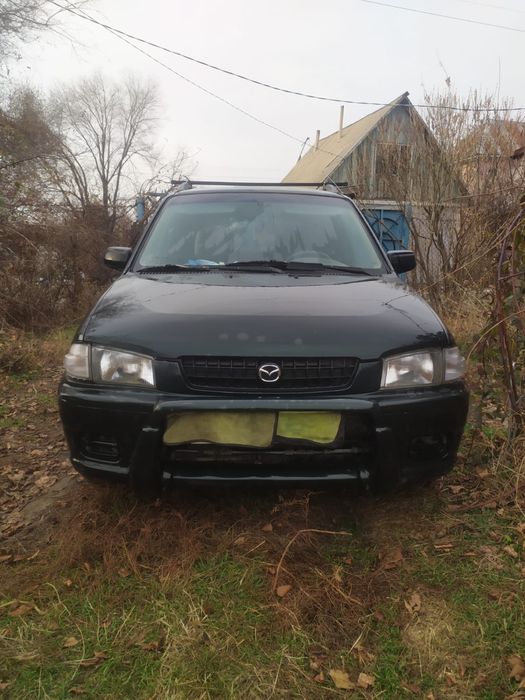 Продам машину Mazda Demio