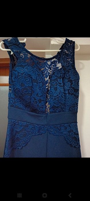 Vând salopeta albastra