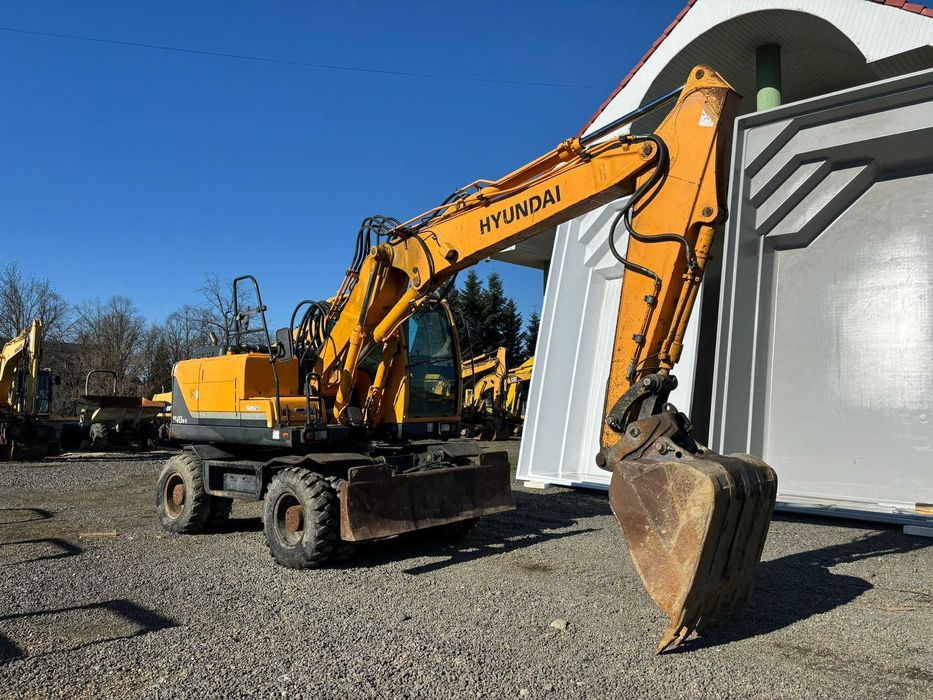 Excavator pe roti Hyundai Robex 140W - 9, 14 tone, 2010