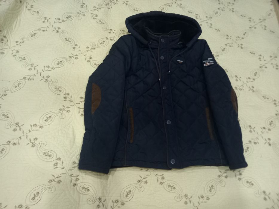 Продам теплую куртку