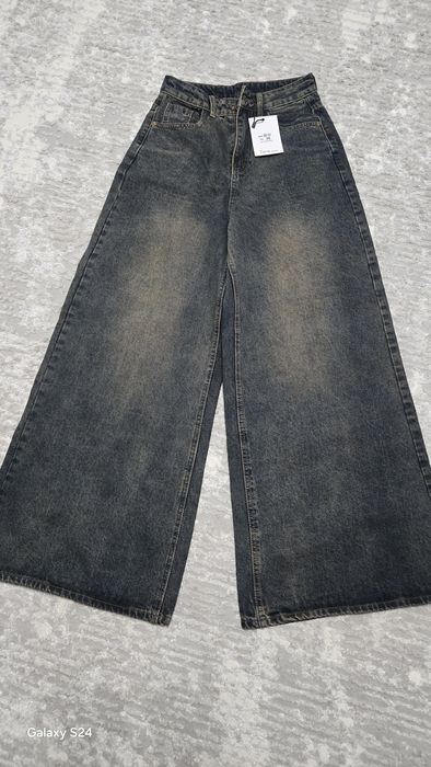 Абсолютно новые джинсовые брюки