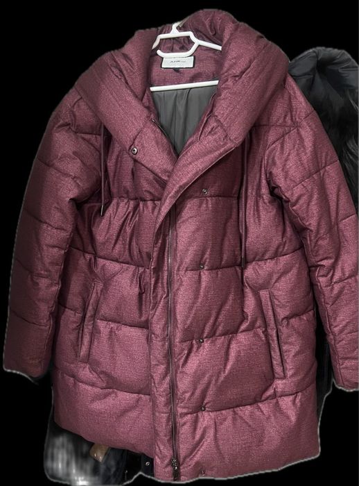 Пуховик средней длины новый