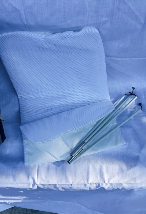 Раница с място за повиване на бебе