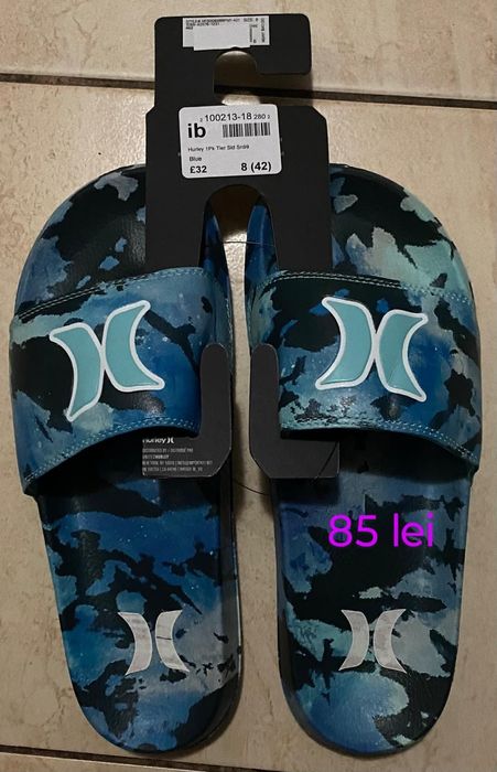 Adidași și papuci barbatesti