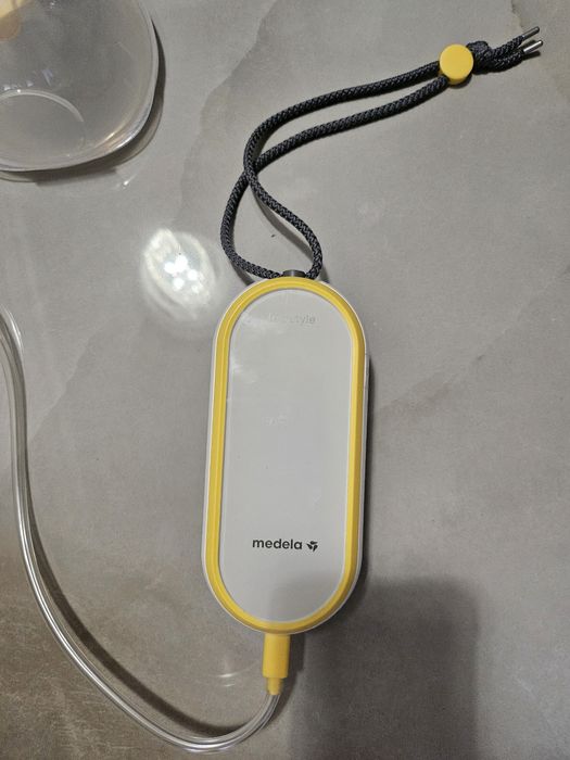 Medela Hands-free Freestyle , Помпа за гърди