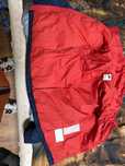 Geaca nike culoarea rosu albastru si alb
