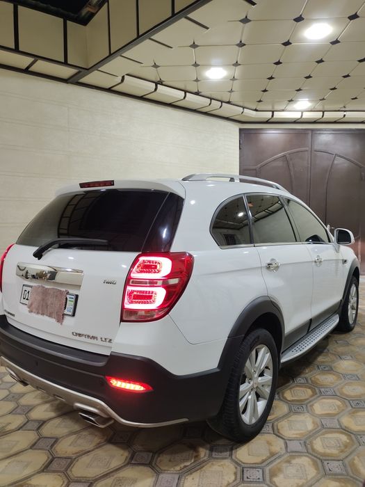 Captiva 3/4 qilingan xujjatdayam Avtomat rangi Oq benzinda