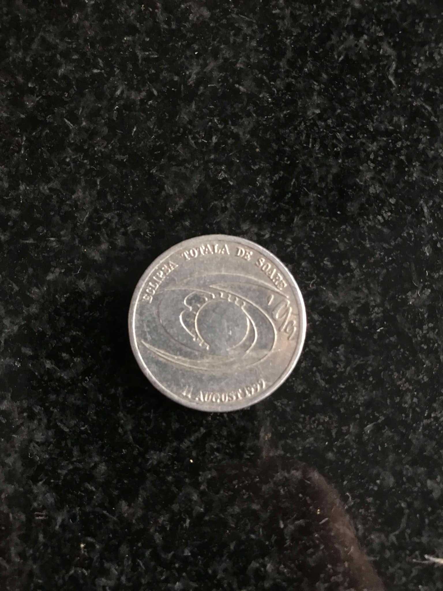 Moneda cu eclipsa