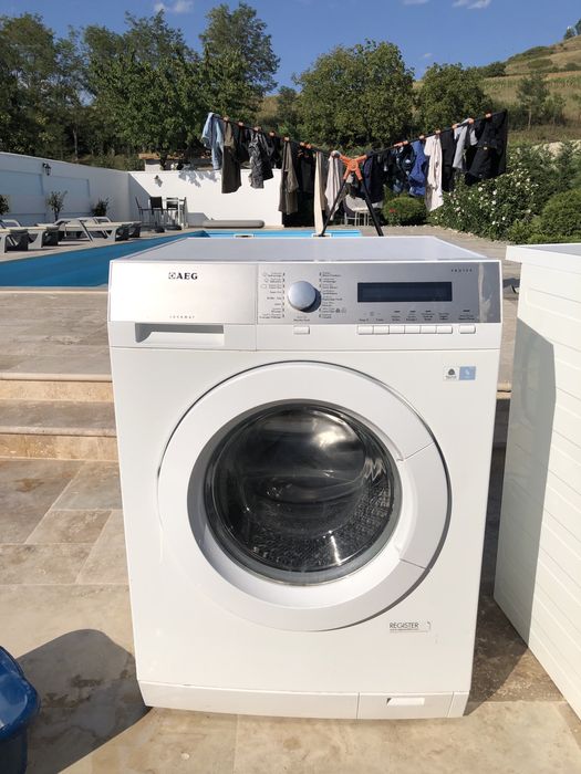 Masina de spalat si uscator de rufe AEG cu pompa de caldura