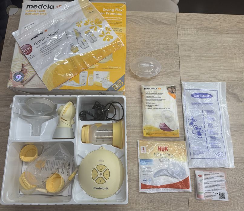 Помпа за кърма Medela Swing Flex Prenium с много подаръци