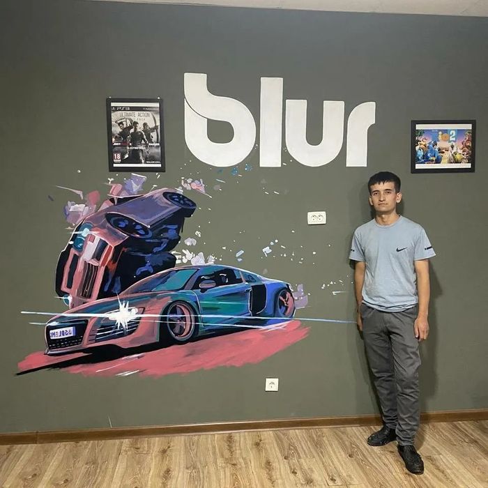 Rassom, Художник, барелеф.