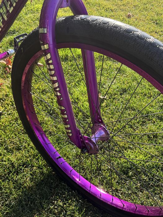 SE bike wheelie , purple rain