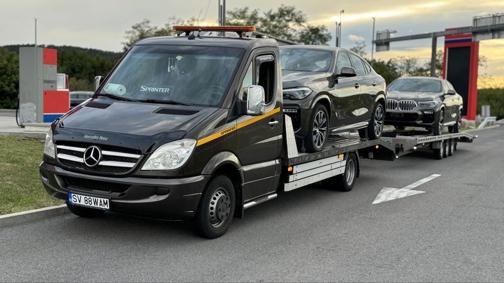 Transport auto pe platformă România-Italia și Italia-România